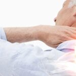 man suffering pain from an injury to the cervical spine