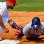 baseball players during game before seeing chiropractic physician