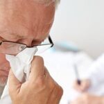 man with allergies visits a doctor