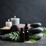 Spa Composition With Aroma Oil On a Grey Table