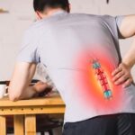 man with herniated disc in pain