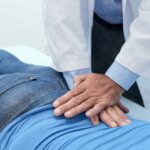 chiropractor working on lower back