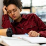 woman-leaning-on-hand-from-exhaustion