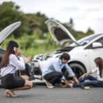 Head-on collision with a woman on the ground being attended to by a male.