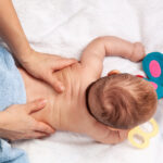 Baby during a pediatric chiropractic session.